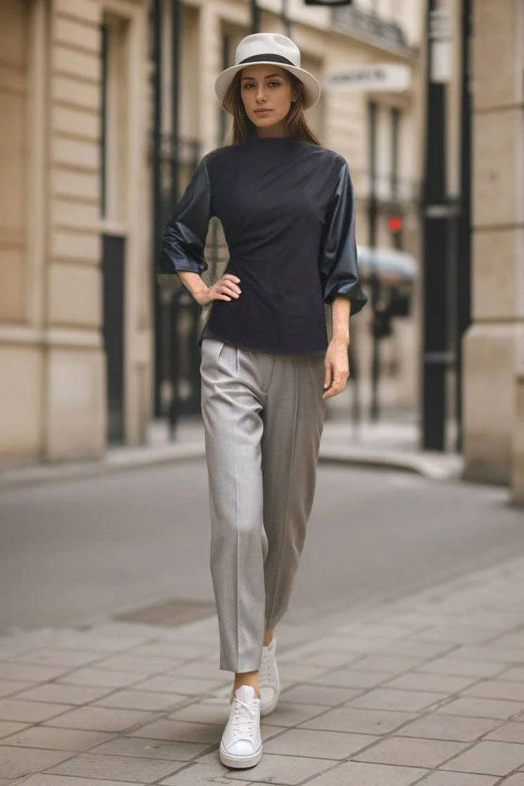 Betty black mock neck bubble sleeve top by VAVA by Joy Han styled with grey trousers