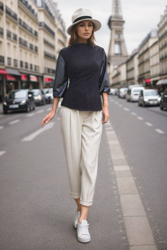 VAVA by Joy Han Betty black mock neck top styled with ivory ankle trousers
