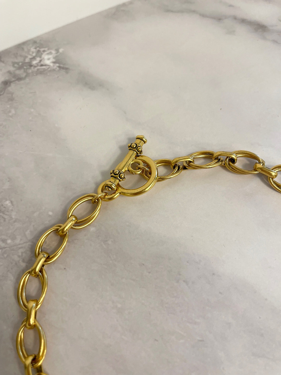 Gold toggle clasp and link chain detail on Heirloom Crystal Drop Necklace