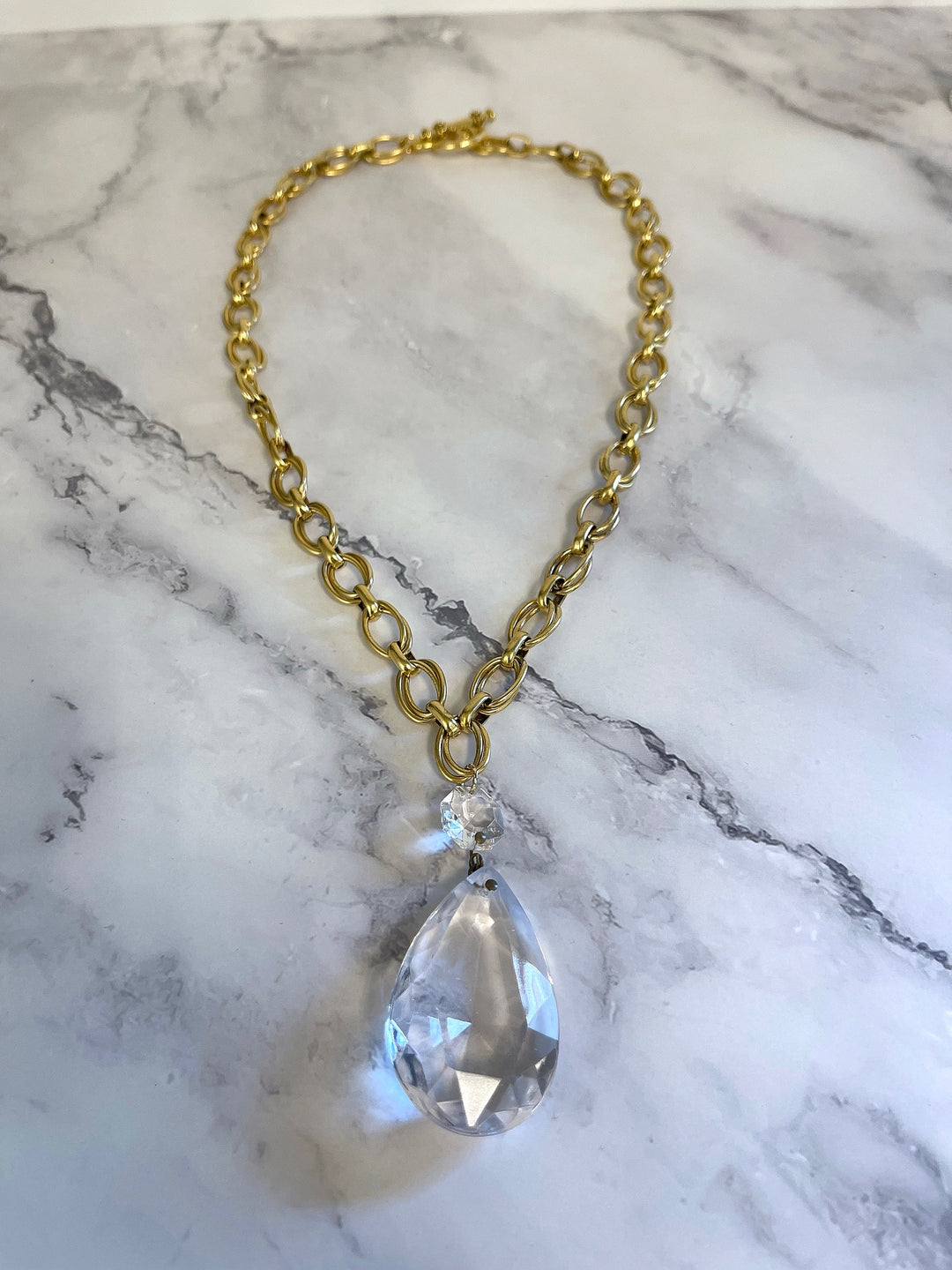 Full view of Heirloom Crystal Drop Necklace with gold link chain and clear crystal pendant