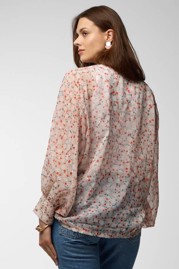 SAACHI floral kimono top styled open with white top and jeans