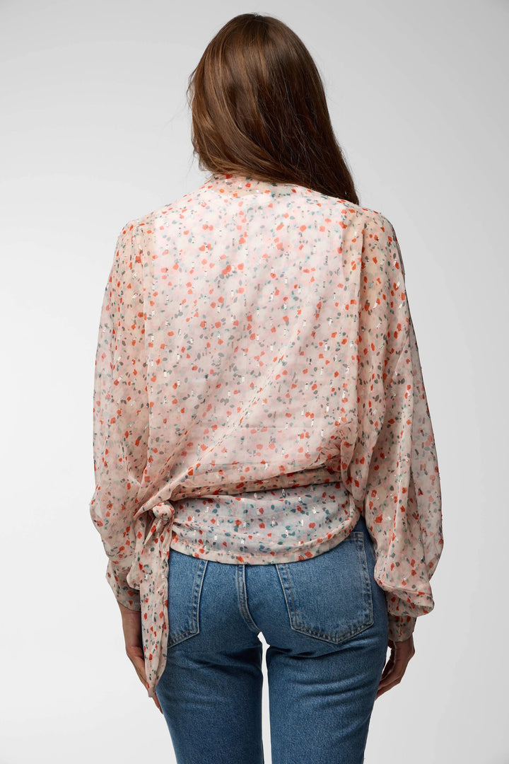 SAACHI tie-front floral kimono top styled casually with denim