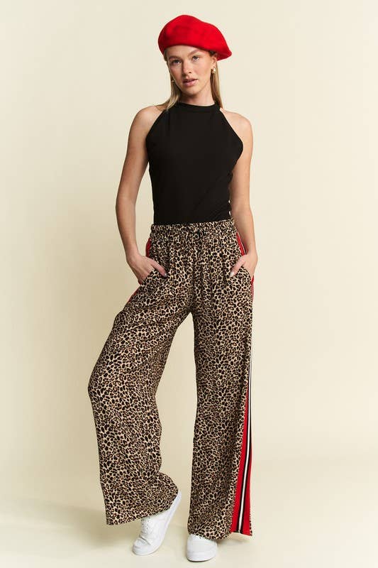 Women’s leopard wide leg pants with red black and white side stripe