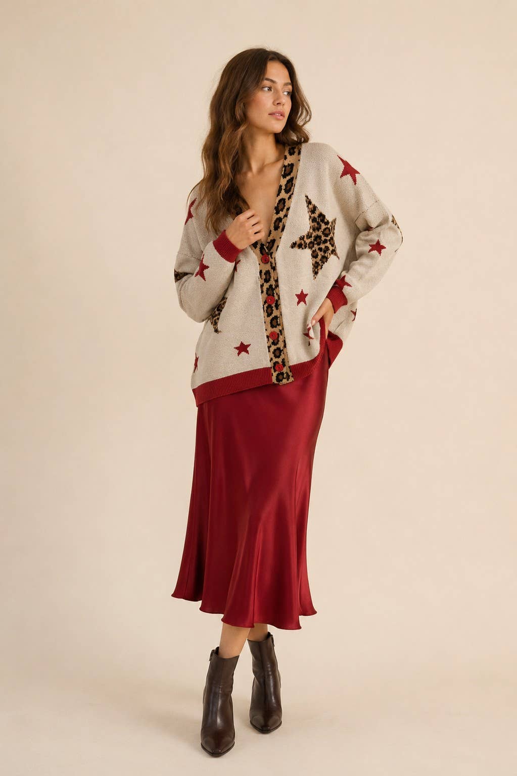 Oatmeal leopard star button-down cardigan styled with red satin midi skirt