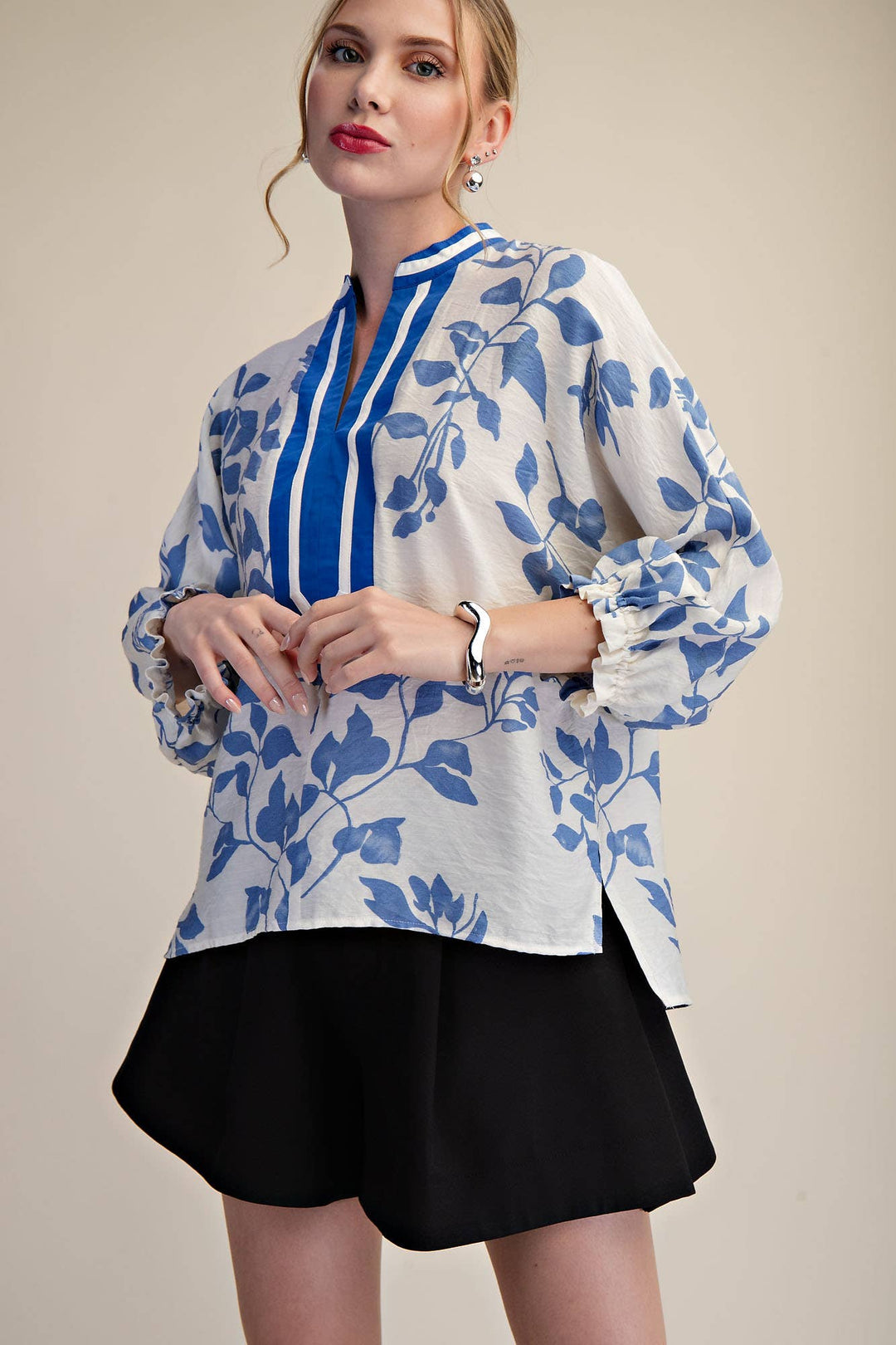 Ink & Ivory Blouse in Blue with ivory botanical print, contrast V-neck trim and ruffled sleeves