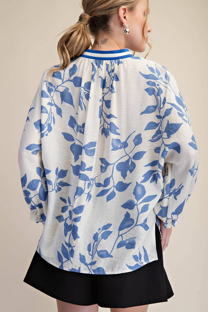 Back view of Ink & Ivory Blue blouse showing botanical print, gathered neckline and relaxed fit