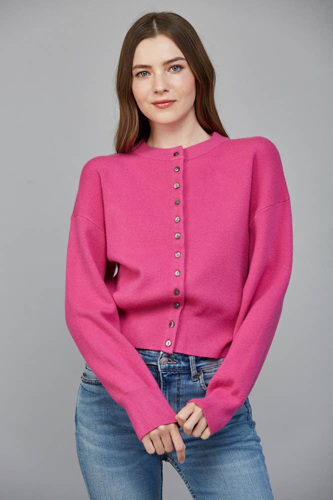 Pop of Pink Cardigan in bright pink with long sleeves, dropped shoulders and button-front styling.