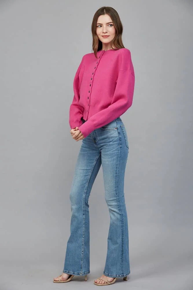 Pop of Pink Cardigan styled with blue jeans, showing the cardigan’s length and relaxed everyday fit.
