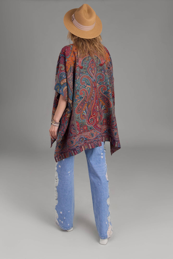 Back view of SAACHI Regal Rococo paisley poncho