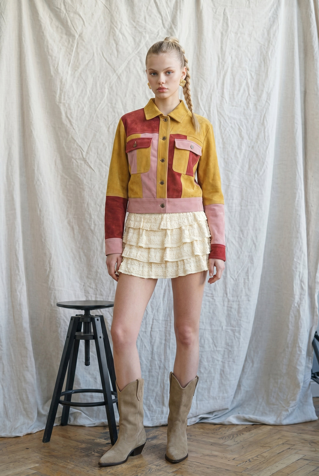 Mustard, rust and blush pink colorblock suede jacket with pointed collar, button front, patch pockets and cropped silhouette.