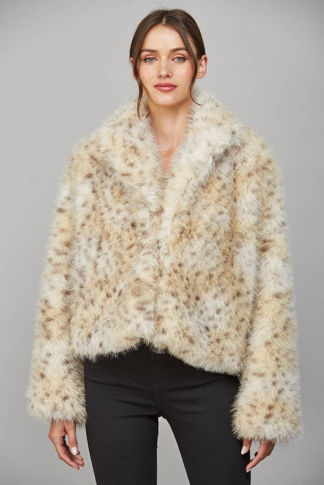 Wild Intentions cream spotted faux fur coat shown from the front with oversized collar and cropped silhouette.