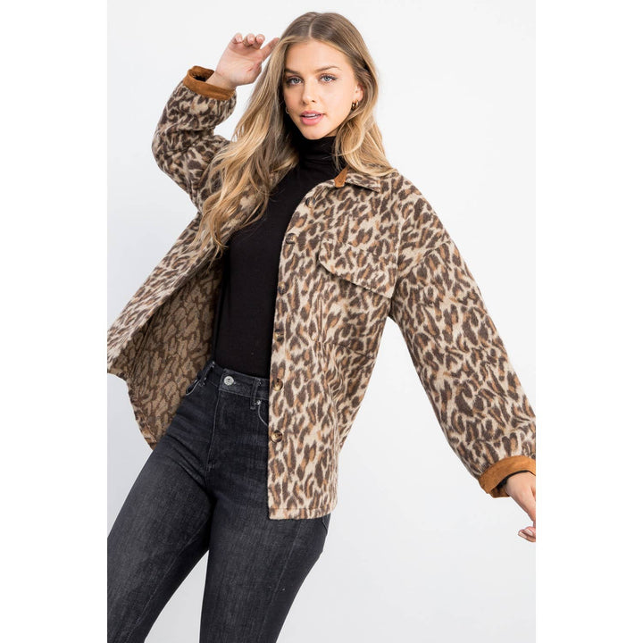 Leopard print jacket worn open showing relaxed silhouette, button front and soft brushed fabric.