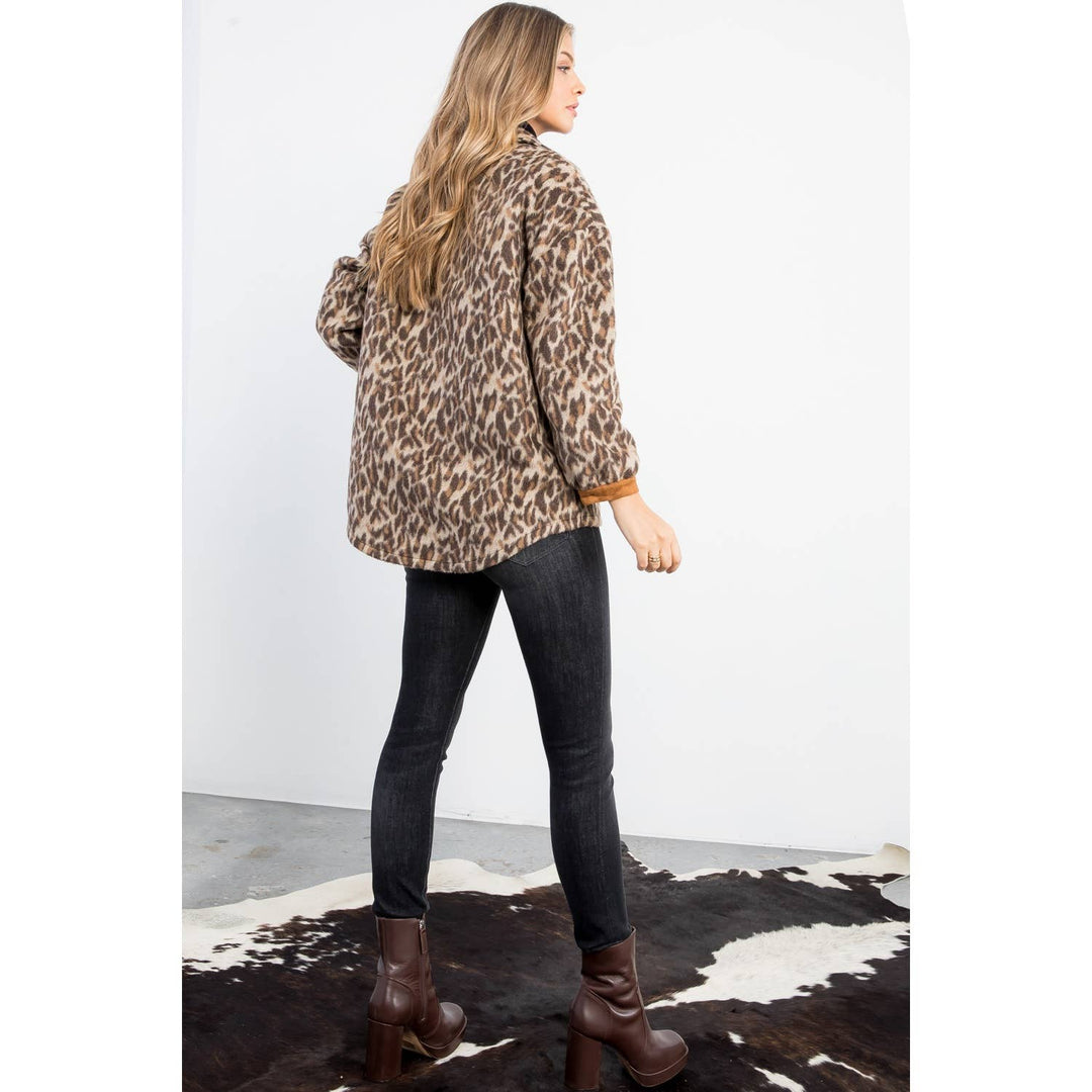 Back view of Wild Thing leopard print jacket showing relaxed fit, soft brushed texture and hip-length hem.