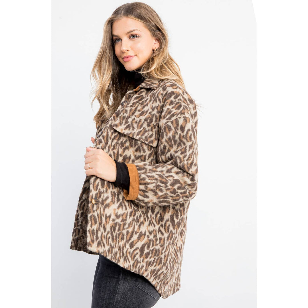 Leopard print jacket worn open showing relaxed silhouette, button front and soft brushed fabric.