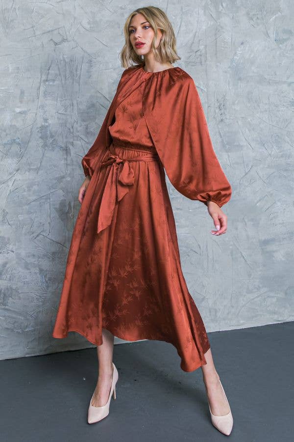 Model wearing bronze jacquard satin long sleeve midi dress