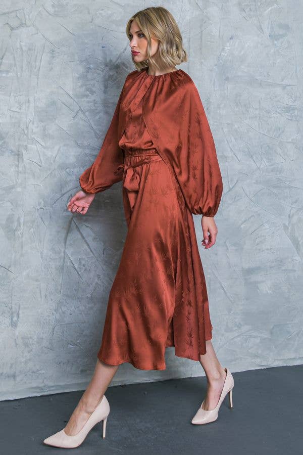 Side view of bronze jacquard satin midi dress with full skir