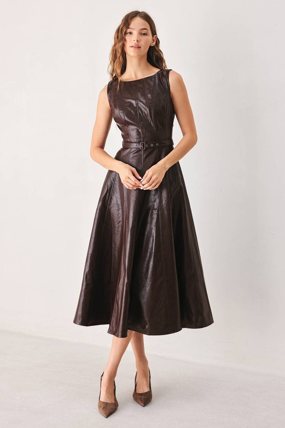 Model wearing Chocolate Theory dark brown faux leather midi dress