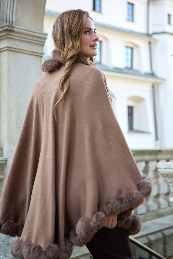 Back view of camel faux fur trimmed cape by SAACHI