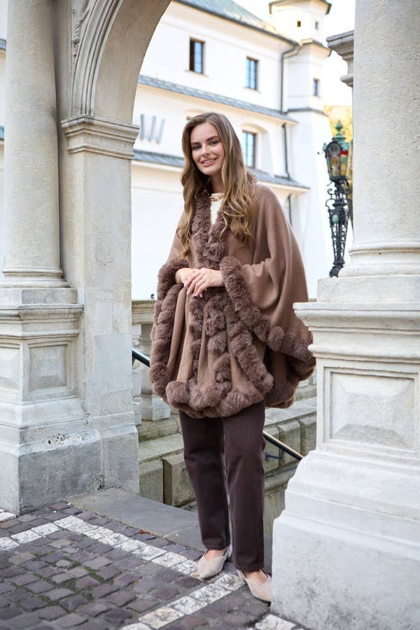 Camel SAACHI faux fur cape styled with brown pants
