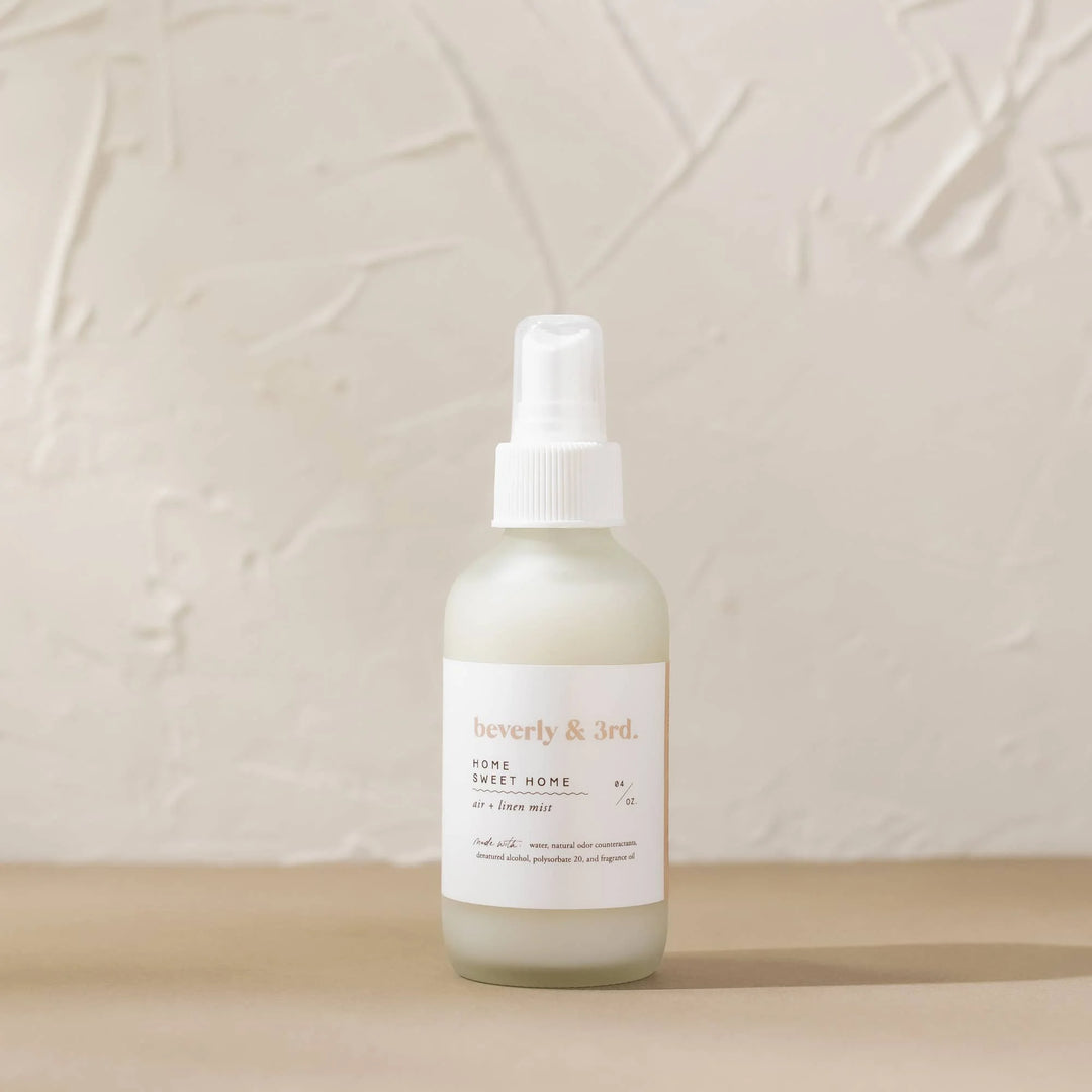Home Sweet Home Air + Linen Mist in 4 oz frosted glass bottle with apple, blueberry and pumpkin fragrance notes.