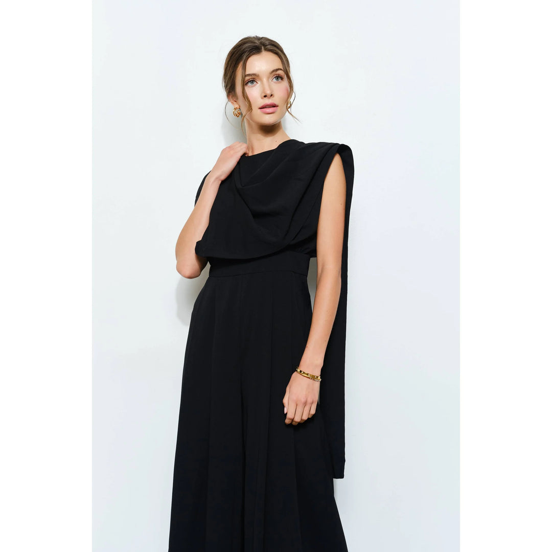Black special occasion jumpsuit with draped scarf neckline, defined waist and flowing wide-leg pants