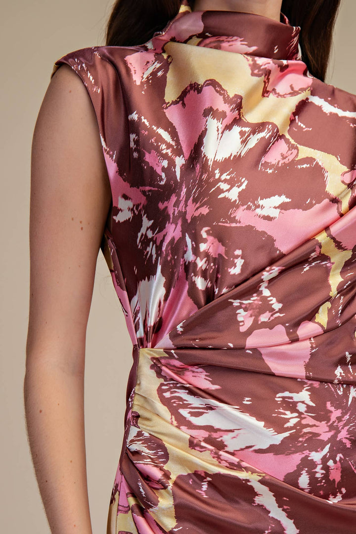 Close-up of pink and chocolate floral dress mock neck and ruching