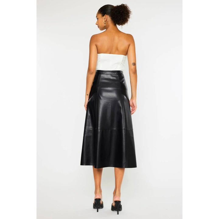 Back view of Rebel Luxe black faux leather midi skirt showing smooth waistband, seam details and A-line silhouette