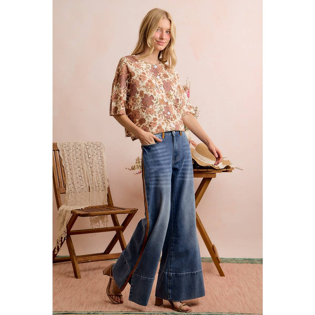 Model wearing Sidekick Contrast Stripe Wide Leg Jeans in medium wash denim