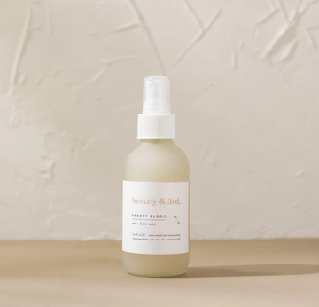 a bottle of liquid with a white label